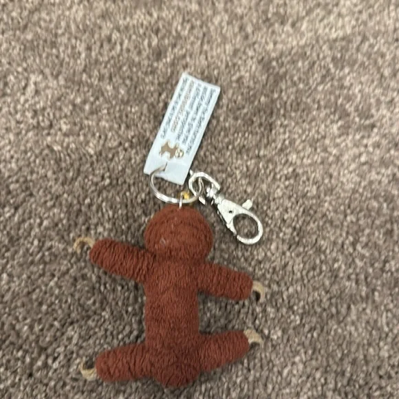 The string doll game Sammy the sloth keychain - Picture 2 of 3